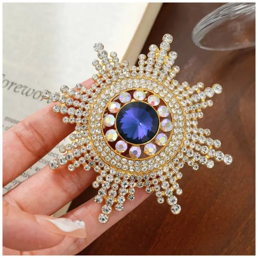 Regal Radiance Starburst Brooch Sapphire Blue Center Vintage Rhinestone Elegance